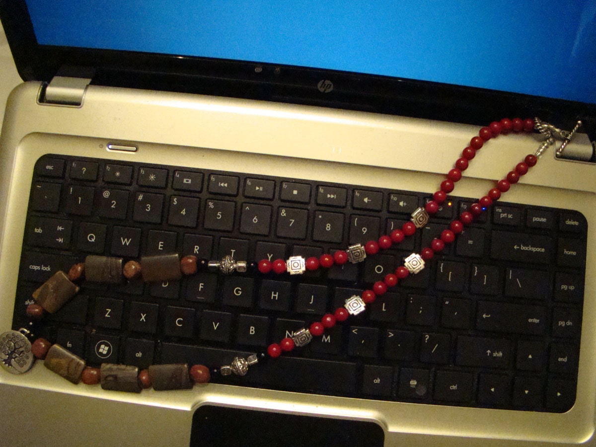 Beautiful Hand-Strung Polished Stone, Jasper and Dyed Red Coral Eternal Tree Medallion Necklace with Silver Metal And Black Glass Beads