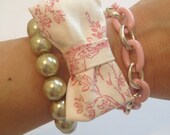 Three piece fashion bracelet set.  Stacking and layering - Bow-tie bracelet, links, beaded. Color choice of Pink, blue, green.