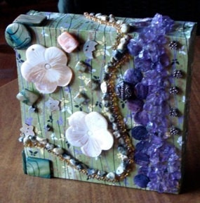3D mixed media meditation piece. sea shell flowers, purple green