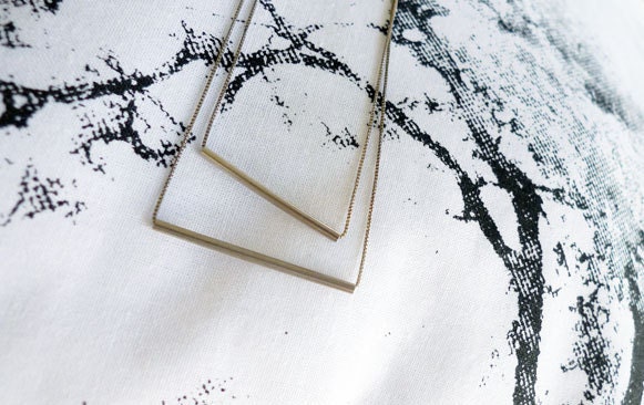 ON SALE Two Cushions Covers and an Asymetric Trapeze Necklace