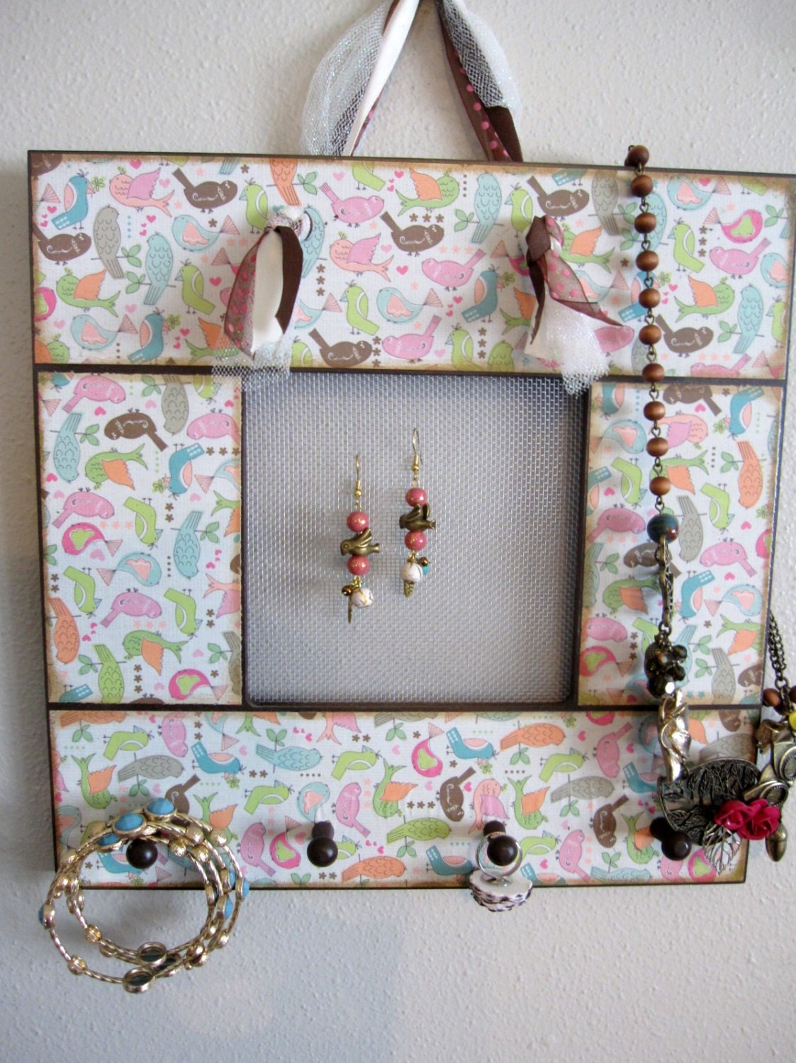 Custom designed jewelry holder to organize all your jewelry so it's on display to accessorize your next outfit.