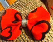 Red with heart pattern bow with plaid middle