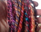 Handspun art yarn corespun hand dyed silk caps plied with art batts  50 yds  3-4wpi