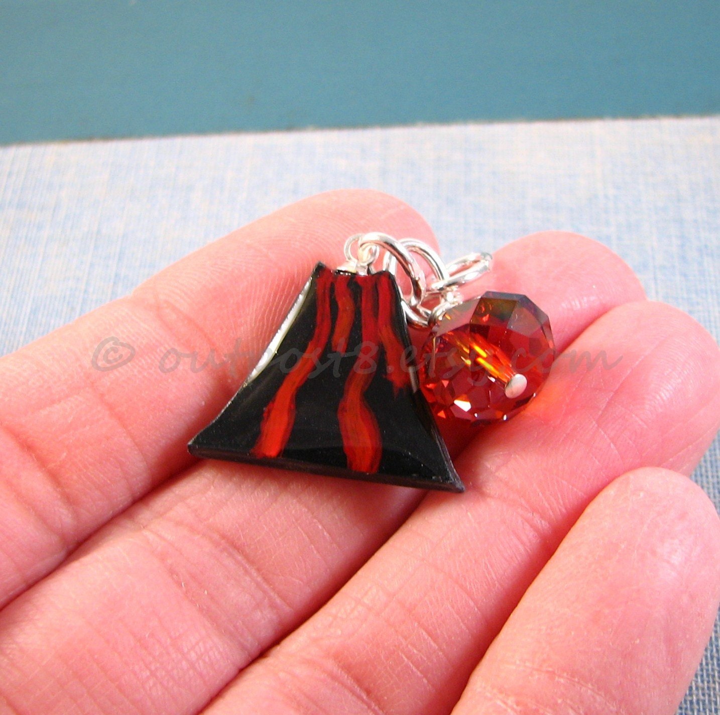 Little Volcano. Polymer clay, resin, and Swarovski crystal. Necklace, phone charm, or keyring. Free US shipping.
