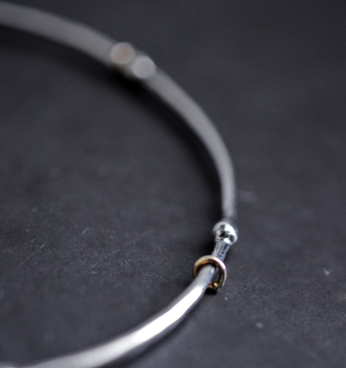 I am a babbling brook...single bangle bracelet in sterling silver and 14 karat gold