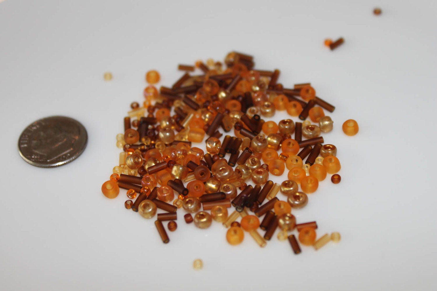 Mixture of Brown and Orange Glass Beads - .8oz