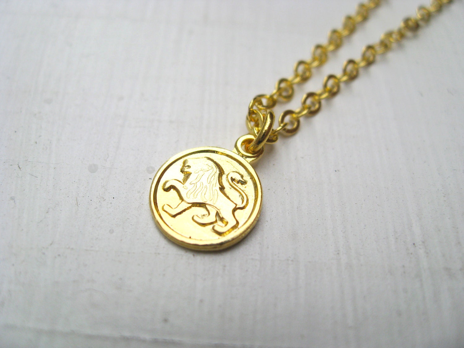 LEO // tiny zodiac charm necklace.