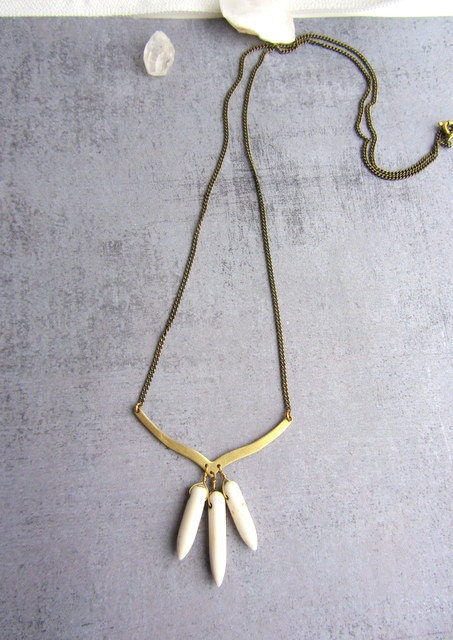 Gold brass chevron arrow necklace with white stone spikes, stamement jewelry.