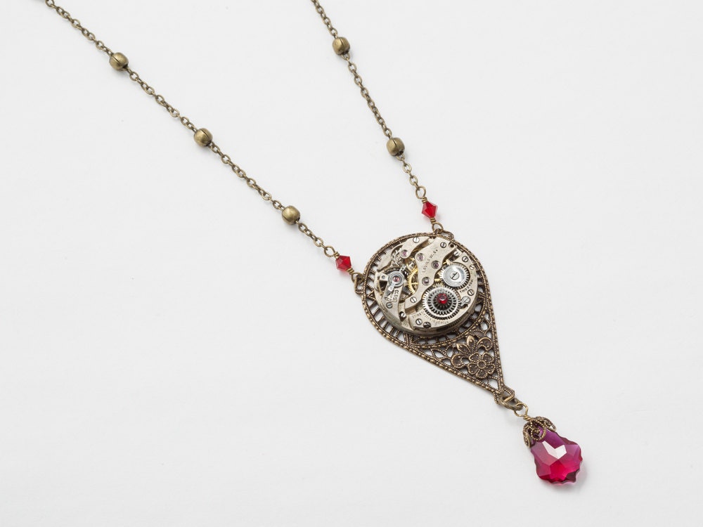 Steampunk Necklace Steampunk jewelry vintage watch movement gear ruby red Swarovski crystal Victorian gold flower filigree pendant Gift 1940