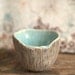Little sculptural mushroom bowl.  Textured porcelain, rustic, ivory, aqua and brown.