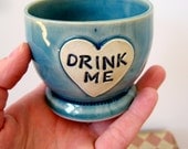 Alice in Wonderland Shot Glass 'Drink Me' heart shaped stoneware Frosty blue