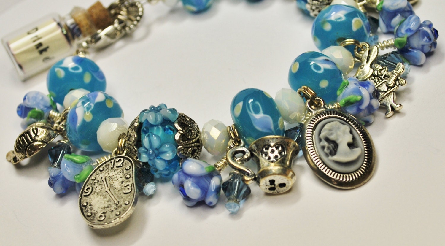 Alice in Wonderland Inspired Blue lampwork and Swarovski Crystal Beaded Floral Charm Bracelet  Free US Shipping