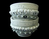 Two Sprocket and Teeth Cups