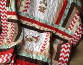 Blue, red chevron, brown, and cream sock monkey baby quilt approx. 50x58