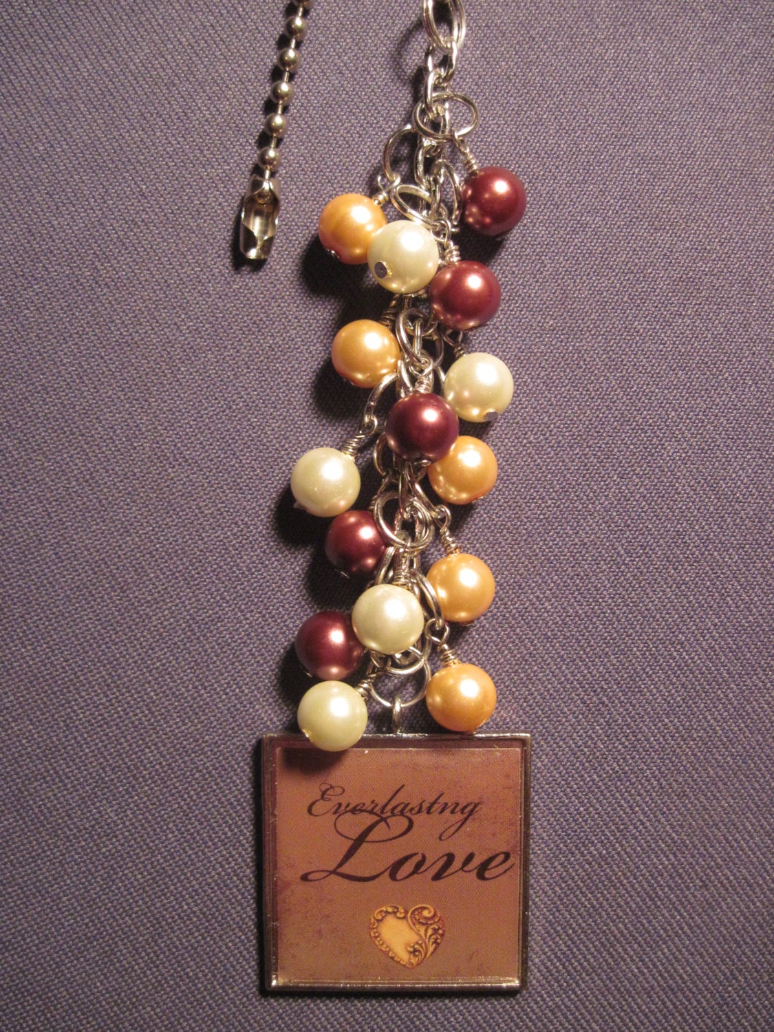 Bronze, Gold, and Ivory Glass Beaded Fan Pull with Everlasting Love Charm