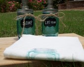 Two Dispensers and One Tea Towel