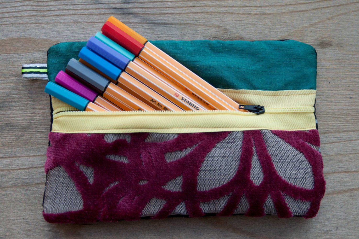Textured pencil case - Green, yellow, dark red