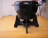 Heavy cast iron black enamel Bodum fondue pot