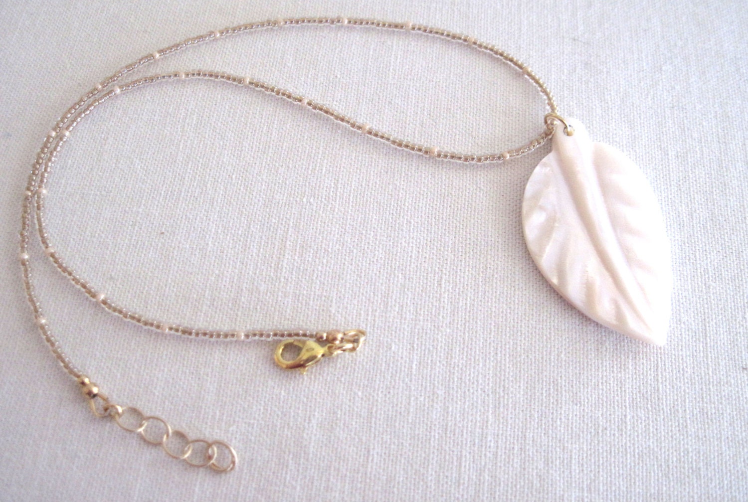 Mother of Pearl Leaf Pendant on Hand Beaded Necklace in Gold-Resort Wear- Beach Wear-Casual