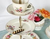 3 tier cake stand / cupcake display:  English country garden china upcycled to create this pretty tiered cake stand