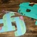Wooden TFJ IttXi Letters.