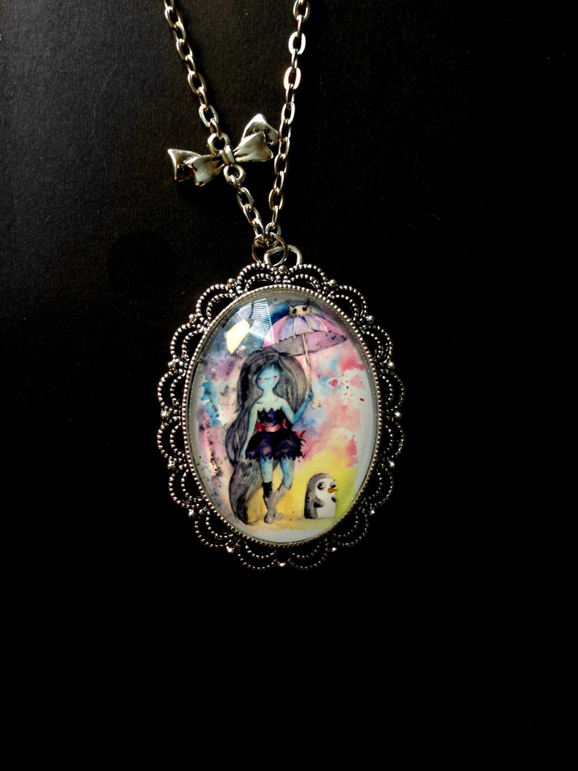 XL Fancy Marcelne and Gunther Necklace (w/bow charm). Glass domed pendant on chain. Adventure Time Finn and Jake