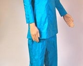 Vintage 1970s teal and light blue striped pant trouser suit with long sleeved tunic and flared pant trousers