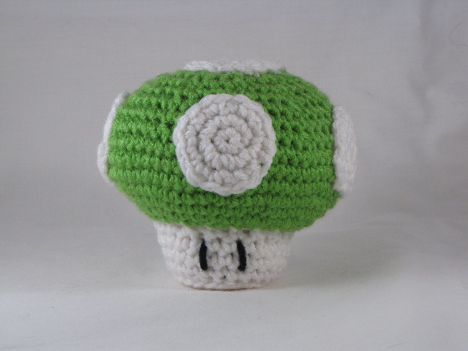 Mario Mushroom amigurumi green mushroom from Super Mario Bros. crochet doll, toy, plushie, geeky video game collectible.