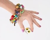 Day of the Dead Charm Bracelet - loaded with skulls and vintage trinkets
