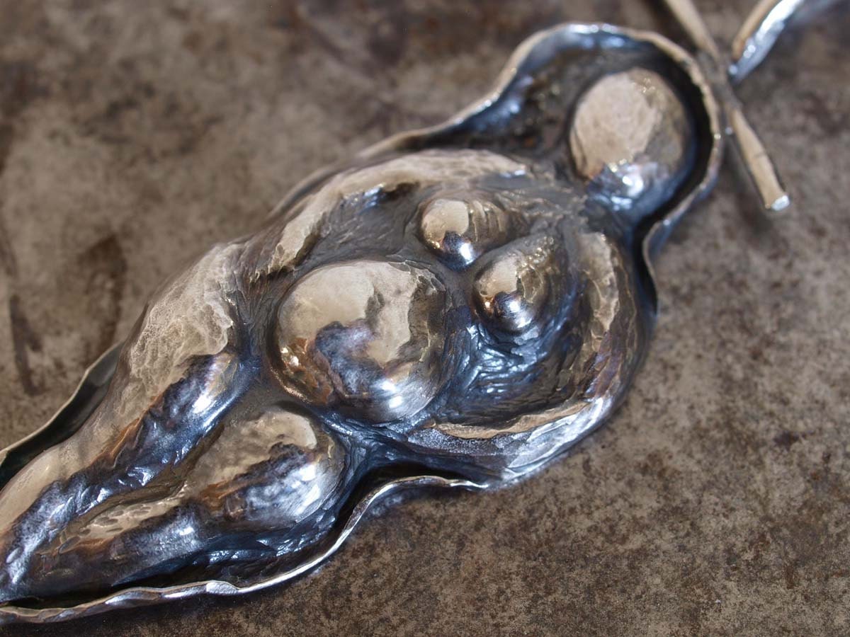 Mother, Goddess, Fertility figure pendant chased and repoussed in sterling silver