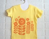 hand-printed baby tee, sunny yellow flower garden