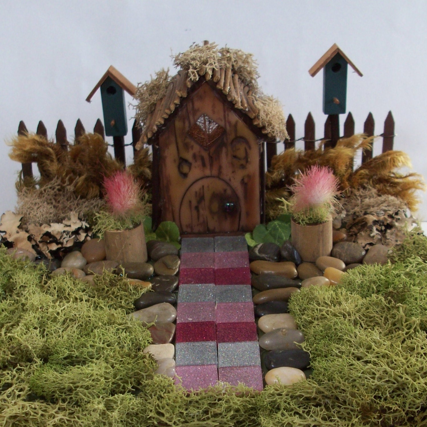 Fairy Garden or Gnome garden with mossy lawn