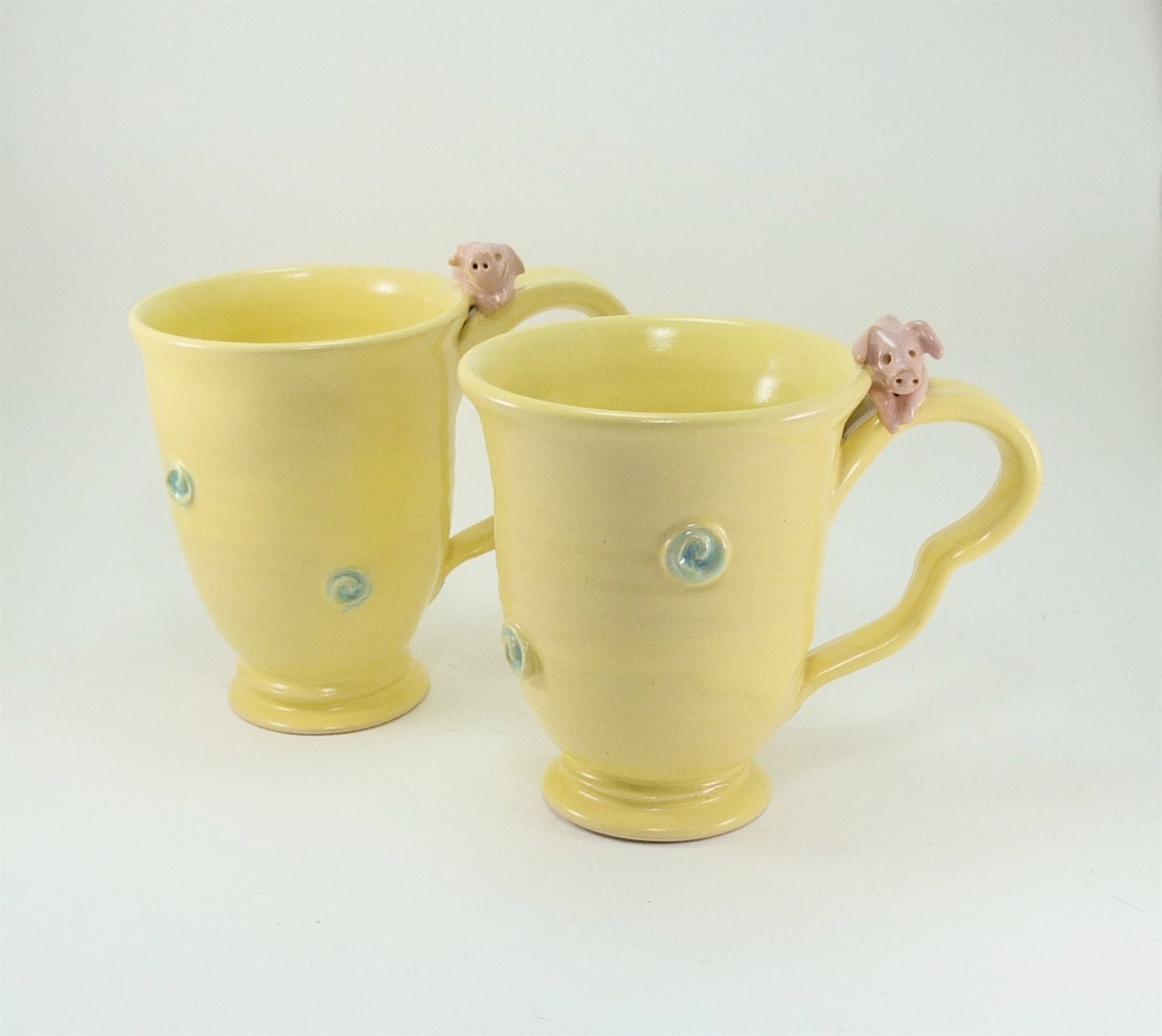 awesome pair of yellow piggy mugs