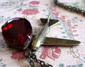Mile High: aged brass airplane and vintage large glass jewel extra long charm necklace