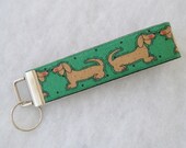 Key Fob wristlet - Dachshunds with green background