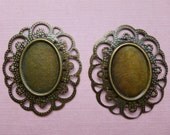 2 stamped BRASS CAMEO SETTINGS 40mm bezels