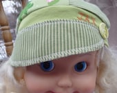 Toddler sized Jax Hat in green froggie fabrics with stripes
