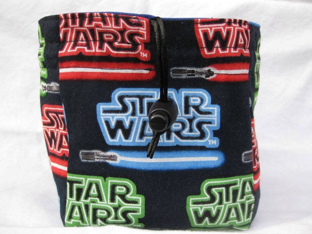 Star Wars light saber and blue square bottom dice bag