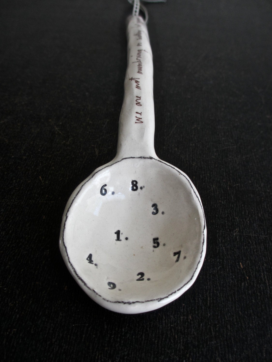 hanging SPOON (B.).