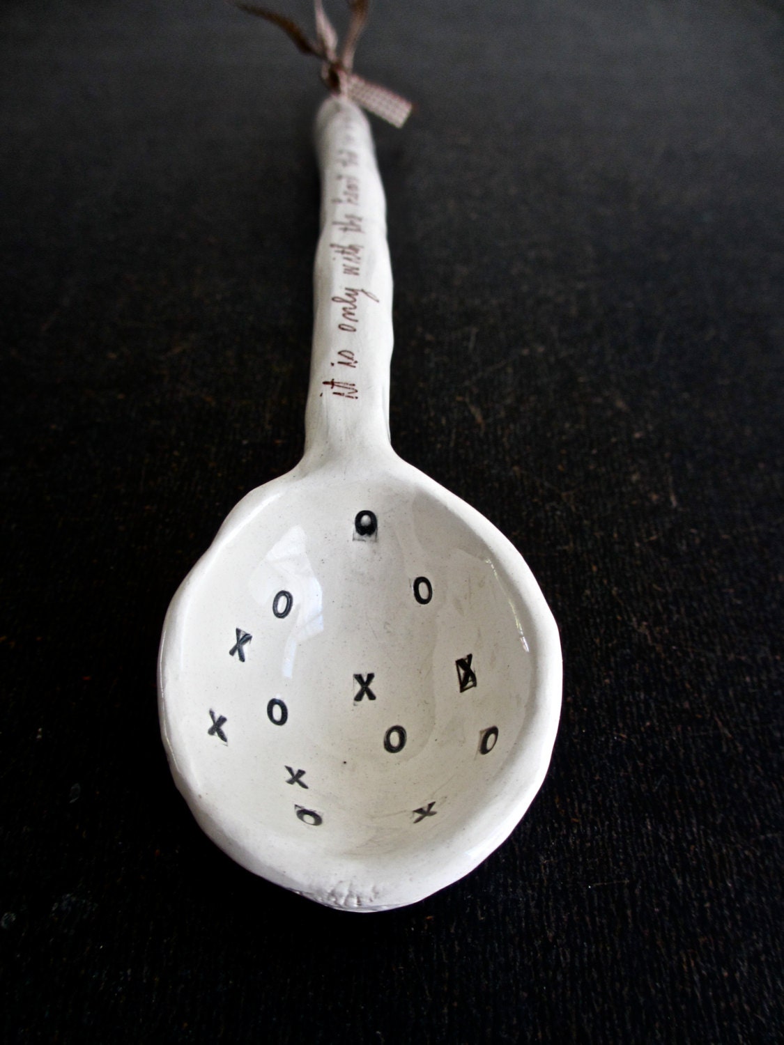 hanging SPOON (C.).