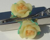 set of 2 hair clips with yellow polymer clay flower embellishments