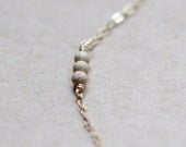stellar in gold - tiny bead necklace by elephantine