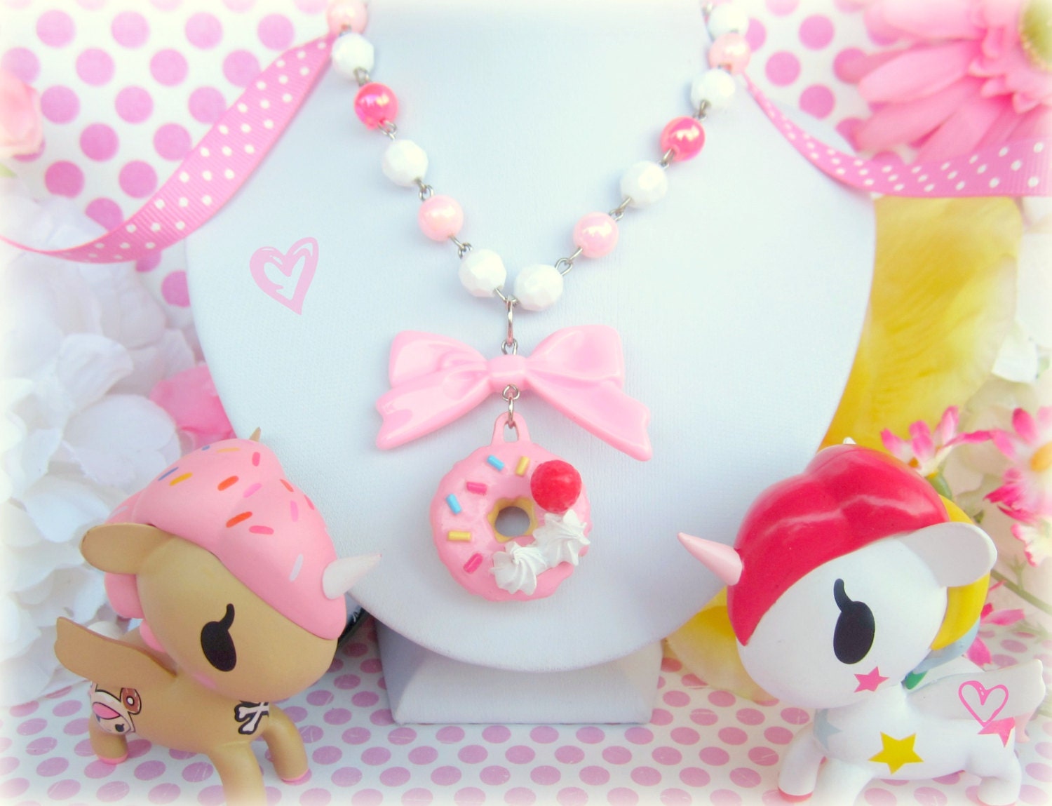 Pink frosted sprinkle donut necklace with whipped creme and strawberry on dangle pink bow with pink and white beaded chain