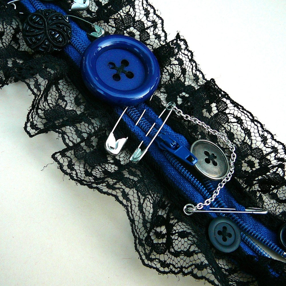 Black and Blue Bricolage Cuff with Zipper, Buttons, and Lace