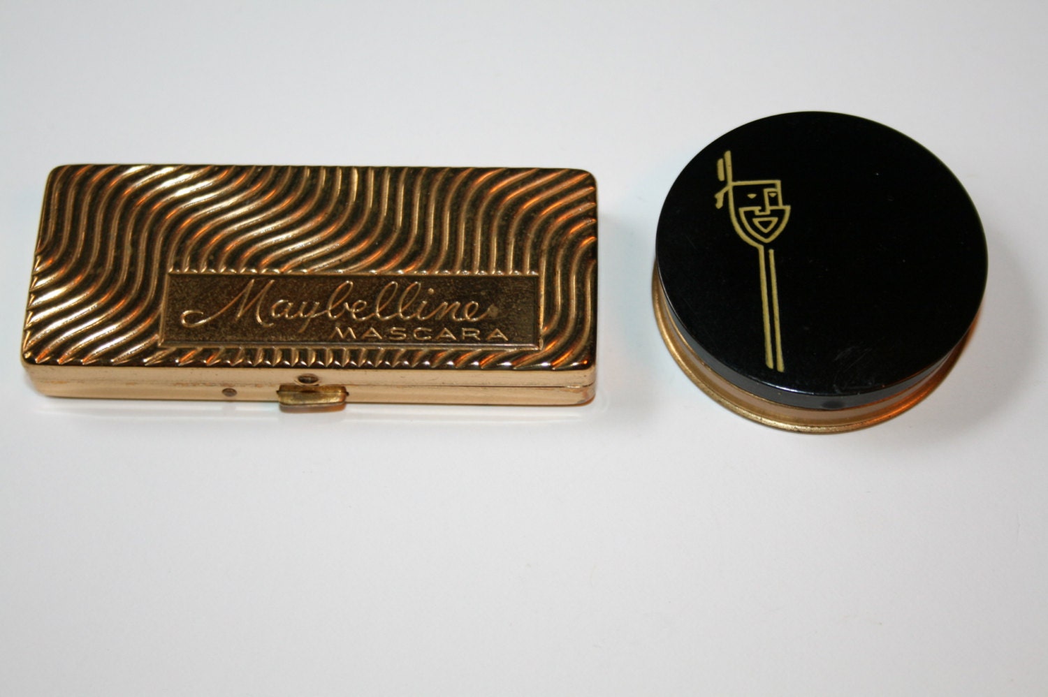two antique make cases small compacts