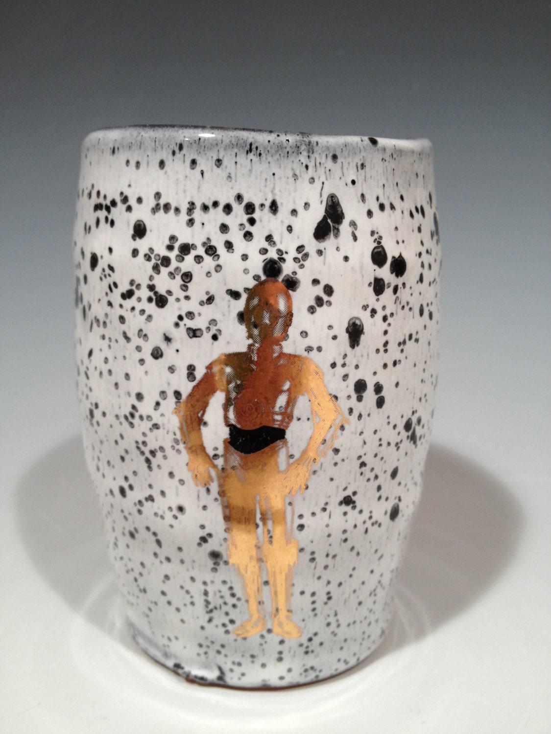Handmade Star Wars tumbler with C3PO in gold.
