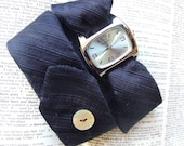 Necktie Necktie Watch Wrap in Midnight with shell button and ice blue silver face