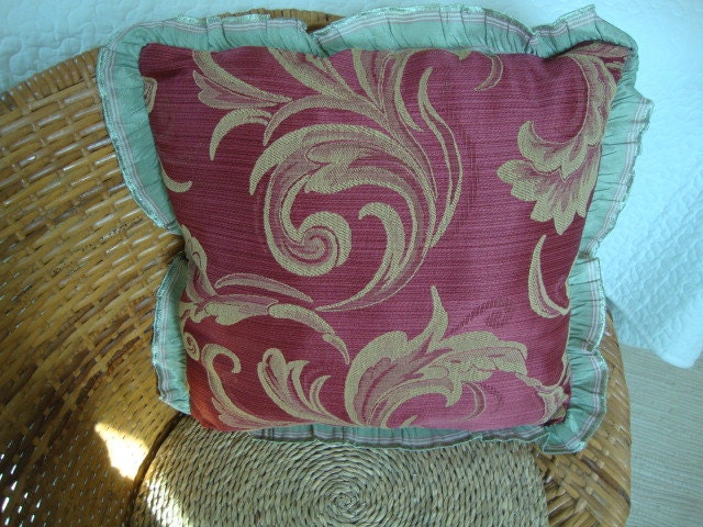 handmade pillow with antique gathered ribbon trim and collectible fabrics