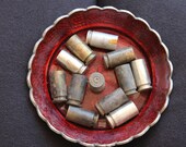 12 empty brass shell casings - 23x12mm