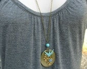 Long vintage locket necklace, verdigris bird charm, oval locket- Botanical Bird original design